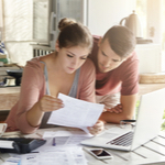 couple looking at bills